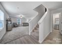 Staircase and half bath visible from living room entry at 654 Lancelot Dr, Richburg, SC 29729