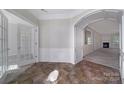 Bright entryway with tile flooring, french doors, and archways at 10474 Bethpage Dr, Fort Mill, SC 29707