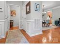 Bright and spacious entryway with hardwood floors and view of dining area at 1036 Silver Gull Dr, Fort Mill, SC 29708