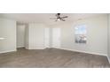 Bright living room with wood-look floors and neutral walls at 517 Pullman Sw St, Concord, NC 28025