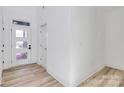 Bright and airy entryway with light hardwood floors at 2601 Mcgill St, Kannapolis, NC 28081