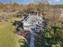 Scenic aerial view showcasing the home's expansive lot and surrounding trees at 318 N Elm St, Marshville, NC 28103