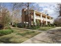 Two story home with a long driveway and mature trees at 505 Briarwood Rd, Lancaster, SC 29720