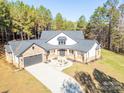 Impressive home with a large lot and tree-lined surroundings at 5164 Green Rd, Stanley, NC 28164