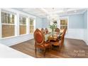 Elegant dining room featuring hardwood floors and a chandelier at 5164 Green Rd, Stanley, NC 28164