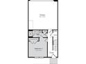 Lower level floorplan showcasing a bedroom, bathroom, garage, and storage at 711 Hoke Ln, Davidson, NC 28036