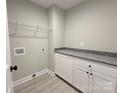 Spacious laundry room with ample storage at 3630 Sentry Rd, Lancaster, SC 29720