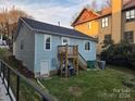 Charming light blue house with deck and stairs at 316 Frazier Ave, Charlotte, NC 28216