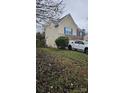 Side view of a two-story home with a truck in the driveway at 6334 Dillard Ridge Dr, Charlotte, NC 28216