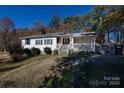 White Ranch home with a large yard at 1020 Harper Keefe Rd, Indian Land, SC 29707