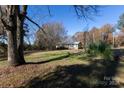Spacious backyard with mature trees, ideal for outdoor living at 1022 Harper Keefe Rd, Indian Land, SC 29707