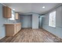 Simple kitchen with light wood cabinets and wood-look floors at 2124 Mcbrayer Springs Rd, Shelby, NC 28150