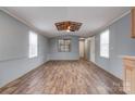 Spacious living room featuring wood-look floors and gray walls at 2124 Mcbrayer Springs Rd, Shelby, NC 28150