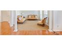 Sitting room featuring hardwood floors and antique furniture at 4201 Amber Leigh Way Dr, Charlotte, NC 28269