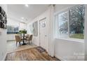 Bright and airy entryway with hardwood floors, leading to kitchen and living areas at 1410 Deborah Cir, Shelby, NC 28150