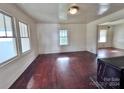Bright living room featuring hardwood floors and ample natural light at 703 Buffalo St, Shelby, NC 28150