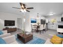 Open living room with kitchen and dining area at 306 S Spargo St, Dallas, NC 28034