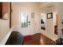 Bright entryway with hardwood floors and view of bedrooms at 5003 Elementary View Dr, Charlotte, NC 28269