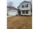 Front view of a two-story home with a two-car garage at 1305 Dodd St, Shelby, NC 28152