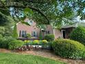 Inviting front yard with lush landscaping and a cozy sitting area at 1011 Ratchford Rd # Lot 1&2, York, SC 29745