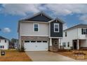 Two-story home with a two-car garage and inviting front entry at 1244 31St St # 6, Conover, NC 28613