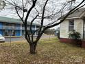 View of the side of the house and adjacent parking lot at 3042 N Oxford St, Claremont, NC 28610