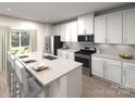 Modern kitchen featuring white cabinets, granite countertops, and stainless steel appliances at 102 Alden Ct, Shelby, NC 28152