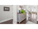 Bright entryway with hardwood floors and a stylish console table at 1209 Cedar Park Dr, Pineville, NC 28134