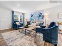 Living room featuring blue armchairs and a cozy atmosphere at 1070 S Old Trade St, Edgemoor, SC 29712