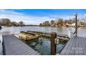 Private dock on the lake with a view of other lake houses at 116 Diamond Head Dr, Mooresville, NC 28117