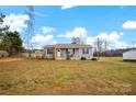 Gray house with a covered porch and a spacious yard at 1220 Lynn Ln, Catawba, NC 28609