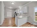 Eat-in kitchen with an island and white cabinets at 4759 Mel Nunnery Rd, Fort Lawn, SC 29714