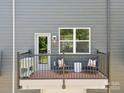 Private balcony with seating area, perfect for relaxing outdoors at 7022 Impulse Ct, Charlotte, NC 28205