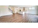 Open kitchen boasts white cabinets and island at 5404 Verona Rd # 36, Charlotte, NC 28213