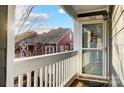 Exterior condo entryway with balcony at 703 Southwest Dr, Davidson, NC 28036