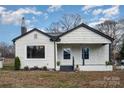 Renovated home with white siding and a gray roof at 5204 Dellinger Cir, Cherryville, NC 28021