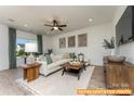 Bright living room with a comfy sofa and large windows at 6316 Honor Ave, Midland, NC 28107