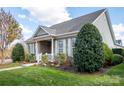 Charming ranch home with brick facade and manicured lawn at 11732 Mount Argus Dr, Cornelius, NC 28031