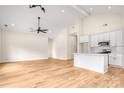 Modern kitchen with white cabinets, quartz countertops, and stainless steel appliances at 1856 County Line Rd, Kings Mountain, NC 28086