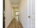 Bright entryway with hardwood floors leading to living areas at 4008 Bufflehead Dr, Charlotte, NC 28269