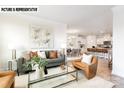 Open living room with a view into the kitchen and dining area at 104 Ari Ave, Troutman, NC 28166