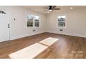 Bright living room featuring hardwood floors and lots of natural light at 138 Pounds Sw Ave, Concord, NC 28025