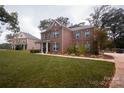 Brick two-story house with landscaping and a red door at 1735 Herndon Farm Rd, Rock Hill, SC 29732