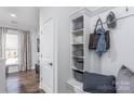 White-washed mudroom with bench, cubbies, and hooks at 1009 Kinship Dr # 71, Lancaster, SC 29720