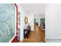 Bright entryway with hardwood floors and a view into the living room at 197 Giant Oak Ave, Statesville, NC 28677