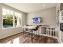 Modern sales office with large window, white table, and material samples at 2208 Millennium Dr # 88, Lancaster, SC 29720