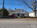 Two-story house with a large front yard and street view at 1002 N Hayne St, Monroe, NC 28112