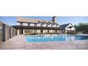Resort-style pool with lounge chairs and adjacent clubhouse at 5365 Mint Harbor Way # 0300, Charlotte, NC 28269