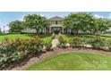 Community clubhouse with landscaping and walking path at 1003 Blue Range Rd, Indian Trail, NC 28079