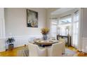 Elegant dining room with hardwood floors and bay window at 1740 Withers Dr, Denver, NC 28037